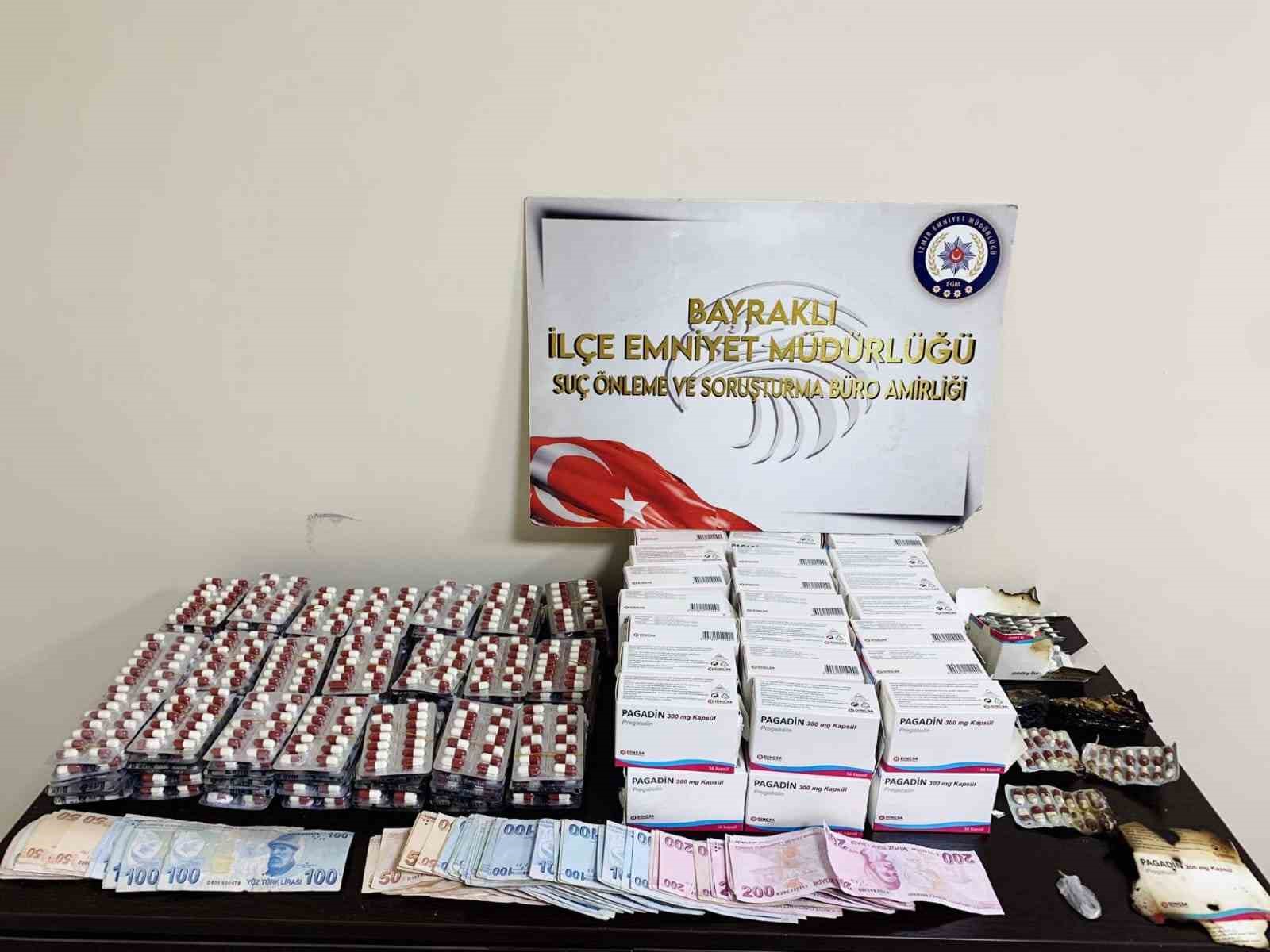 İZMİR'İN BAYRAKLI İLÇESİNDE BİR EVE POLİS EKİPLERİ TARAFINDAN GERÇEKLEŞTİRİLEN OPERASYONDA