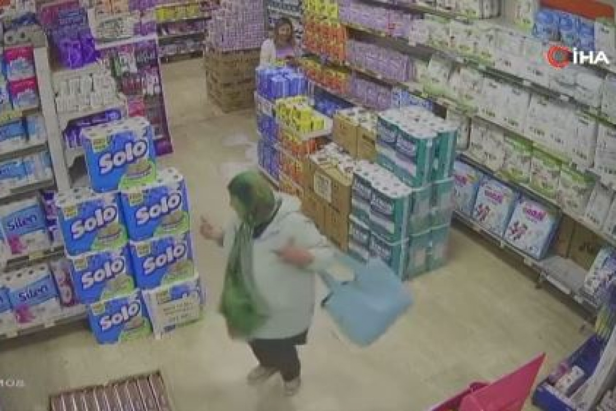 Denizli’de alışveriş yapmak için markete giren yaşlı kadın, sevdiği müziğin