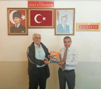 Bandırmalı Gazeteci-Yazar Önder Balıkçı, son kitabını Erdek Kaymakamı Abdullah Atakan