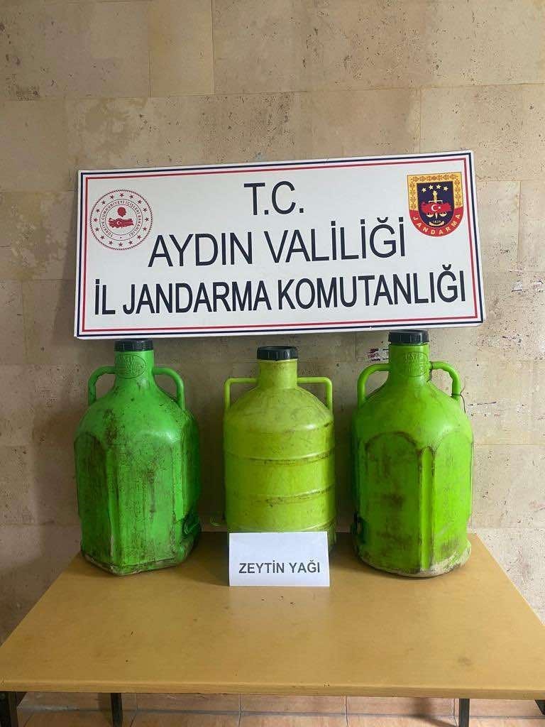 AYDIN’IN GERMENCİK İLÇESİNDE ZEYTİNYAĞI HIRSIZLIĞI GERÇEKLEŞTİREN ŞÜPHELİ ŞAHIS JANDARMA EKİPLERİ