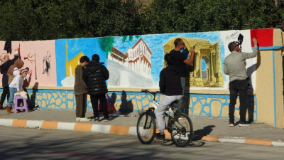 Adana’nın Kozan ilçesinde bir esnaf, yaşadığı ilçenin bazı noktalarının görüntüsünü