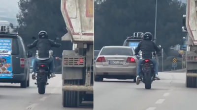 Bursa’da trafiği tehlikeye düşüren bir motosiklet sürücüsü akan trafikte tek
