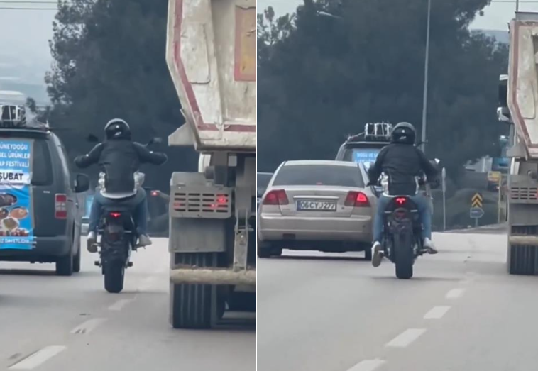 Bursa’da trafiği tehlikeye düşüren bir motosiklet sürücüsü akan trafikte tek