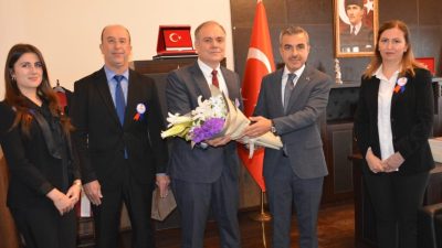 Erdek Kaymakamı Atakan Atasoy, Vergi Haftası’nda Erdek Vergi Dairesi Müdürü’nü