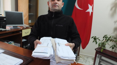 Burhaniye’de muhtarların başı zamanında alınmayan tebligatlarla dertte. Ayda yaklaşık 100