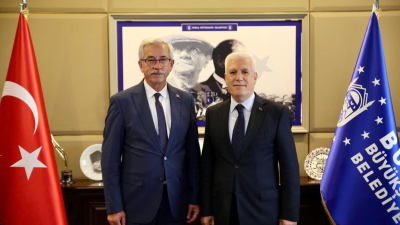 Erdek Belediye Başkanı Burhan Karışık, Bursa Büyükşehir Belediye Başkanı Mustafa