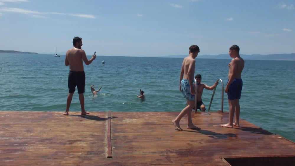 Kuzey Ege de deniz sezonu açıldı Burhaniye, Edremit, Gömeç ve Ayvalık ilçelerinin de içinde bulunduğu Ege’de
