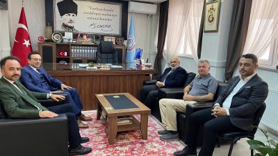 Bandırma İlçe Müftülüğü heyeti, tayini çıkan İlçe Millî Eğitim Müdürü